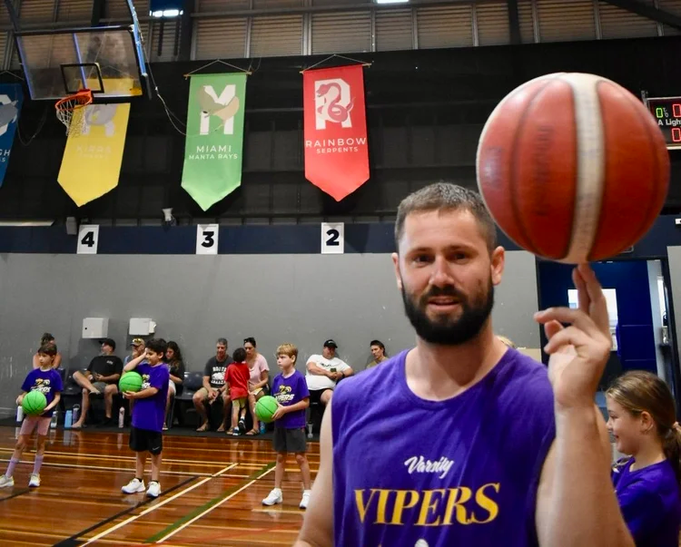 Coach leading a ball-handling station